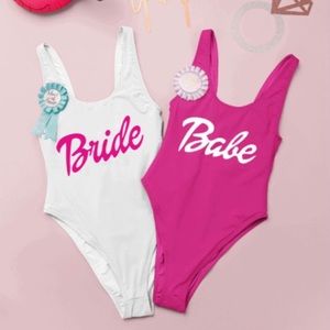 Hot pink large BRIDE Bachelorette Swimsuit with white writing.